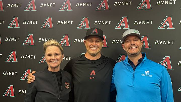Arizona Diamondbacks closer Paul Sewald alongside D-backs SVP, Corporate & Community Impact Debbie Castaldo and Child Crisis Arizona SVP, Development & Communications, Justin Duran.
