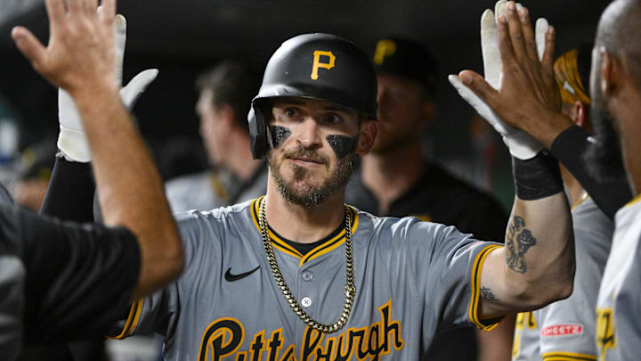 Sep 19, 2024; St. Louis, Missouri, USA; Pittsburgh Pirates catcher Yasmani Grandal (6) is congratulated by teammates after hitting a game tying solo home run against the St. Louis Cardinals during the seventh inning at Busch Stadium. Mandatory Credit: Jeff Curry-Imagn Images Sep 19, 2024; St. Louis, Missouri, USA; Pittsburgh Pirates catcher Yasmani Grandal (6) is congratulated by teammates after hitting a game tying solo home run against the St. Louis Cardinals during the seventh inning at Busch Stadium. Mandatory Credit: Jeff Curry-Imagn Images