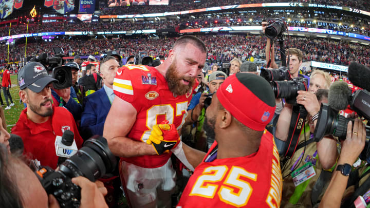 Feb 11, 2024; Paradise, Nevada, USA; Kansas City Chiefs tight end Travis Kelce (87) celebrates with running back Clyde Edwards-Helaire (25) after winning Super Bowl LVIII against the San Francisco 49ers at Allegiant Stadium. Mandatory Credit: Kirby Lee-USA TODAY Sports