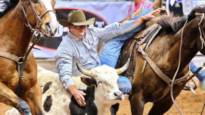 Steer Wrestling action at the Sandhills Stock Show and Rodeo Steer Wrestling action at the Sandhills Stock Show and Rodeo