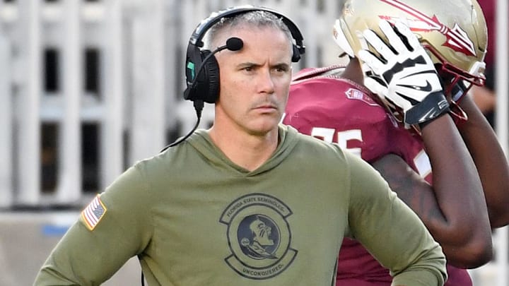 Nov 2, 2024; Tallahassee, Florida, USA; Florida State Seminoles head coach Mike Norvell looks on from the sideline after the North Carolina Tarheels score a final touchdown in the fourth quarter at Doak S. Campbell Stadium. Mandatory Credit: Robert Myers-Imagn Images