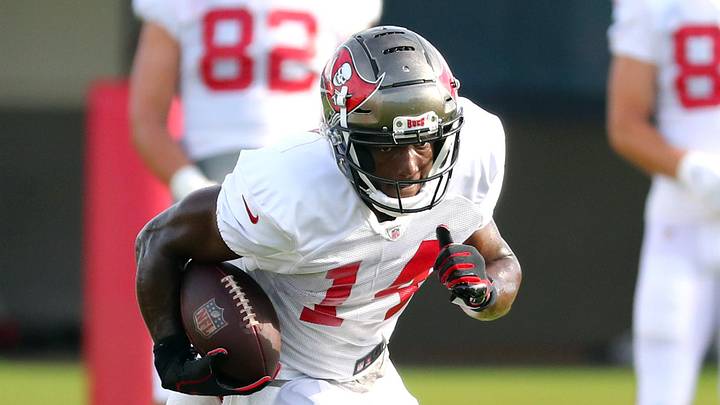 Tampa Bay Buccaneers wide receiver Chris Godwin (14) trains at AdventHealth Training Center. Tampa Bay Buccaneers wide receiver Chris Godwin (14) trains at AdventHealth Training Center.