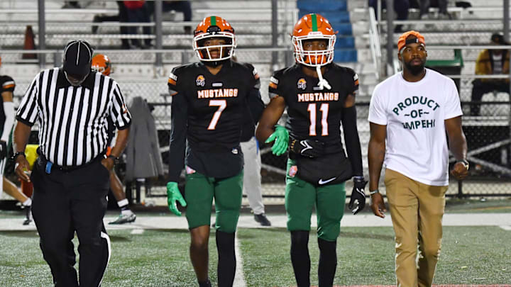 Morgan Park (Illinois) star receiver Nasir Rankin (No. 7) walks out for the coin toss. 