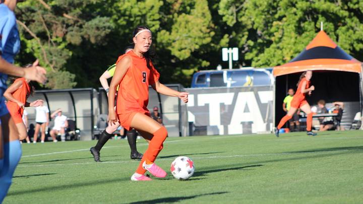 Oregon State soccer player London Tsuma dribbles the ball during a game against Bushnell. Oregon State soccer player London Tsuma dribbles the ball during a game against Bushnell.