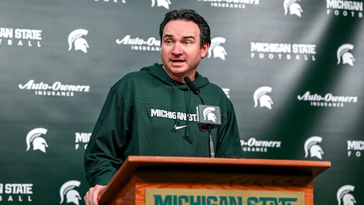 Michigan State coach Jonathan Smith talks the media on the first national signing day for college