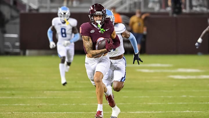 Sep 13, 2025; Blacksburg, Va.; Virginia Tech wide receiver Ayden Greene (0) runs after a catch during the third quarter vs. ODU.