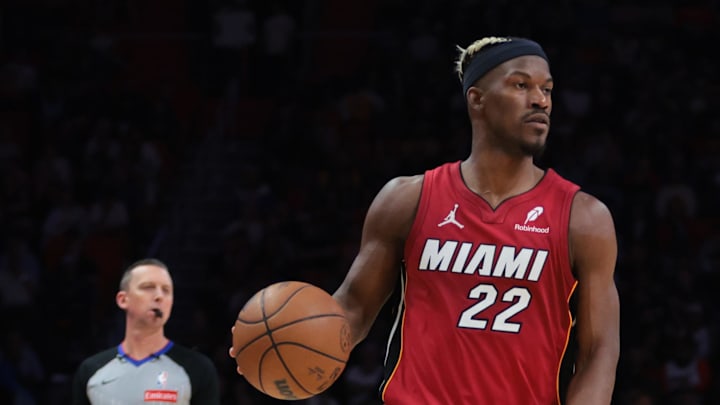 Jan 21, 2025; Miami, Florida, USA; Miami Heat forward Jimmy Butler (22) dribbles the basketball against the Portland Trail Blazers during the second quarter at Kaseya Center. Mandatory Credit: Sam Navarro-Imagn Images