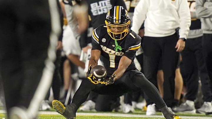 Missouri Tigers wide receiver Donovan Olugbode (1) catches a pass in a game against the Texas A&M Aggies this season. Missouri Tigers wide receiver Donovan Olugbode (1) catches a pass in a game against the Texas A&M Aggies this season.