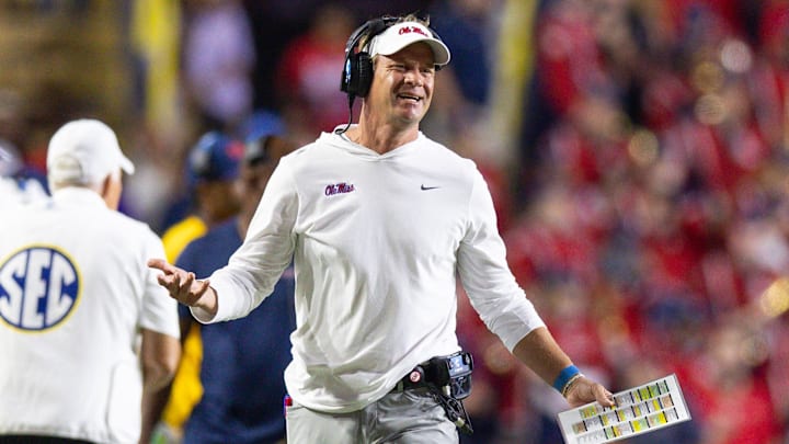 Oct 12, 2024; Baton Rouge, Louisiana, USA;  Mississippi Rebels head coach Lane Kiffin reacts after a play against the LSU Tigers during the second half at Tiger Stadium. Mandatory Credit: Stephen Lew-Imagn Images