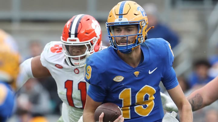 Nov 16, 2024; Pittsburgh, Pennsylvania, USA;  Pittsburgh Panthers quarterback Nate Yarnell (19) runs the ball against the Clemson Tigers during the fourth quarter at Acrisure Stadium. Mandatory Credit: Charles LeClaire-Imagn Images