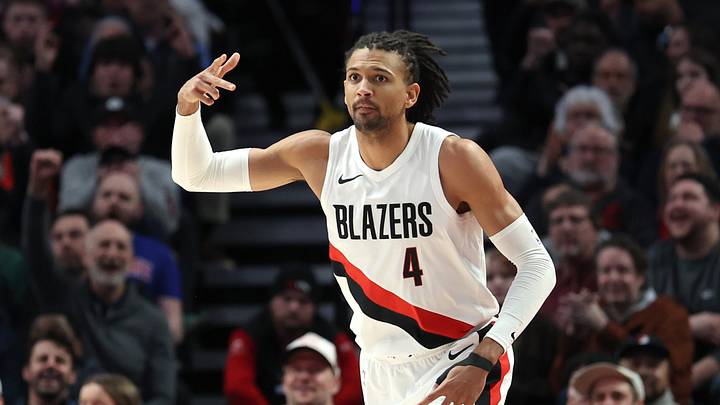 Portland Trail Blazers guard/forward Matisse Thybulle (4) reacts after making a three-point shot against the Charlotte Hornets during the first half at Moda Center on Mar. 10, 2026.