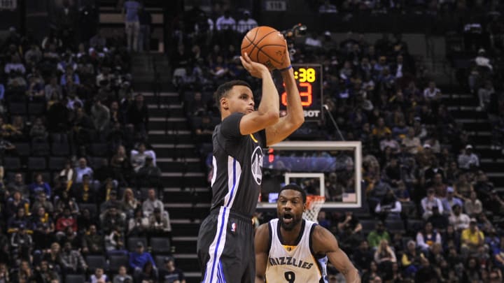 Dec 10, 2016; Memphis, TN, USA; Golden State Warriors guard Stephen Curry (30) shoots the ball in front of Memphis Grizzlies guard Tony Allen (9) during the first half  at FedExForum. 