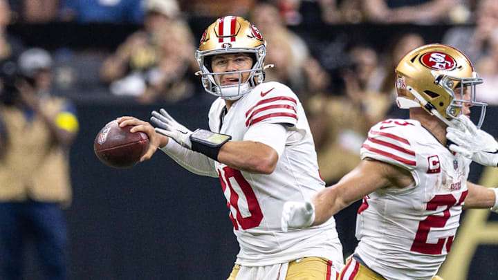 Sep 14, 2025; New Orleans, Louisiana, USA;  San Francisco 49ers quarterback Mac Jones (10) passes against the New Orleans Saints during the first half at Caesars Superdome. Mandatory Credit: Stephen Lew-Imagn Images