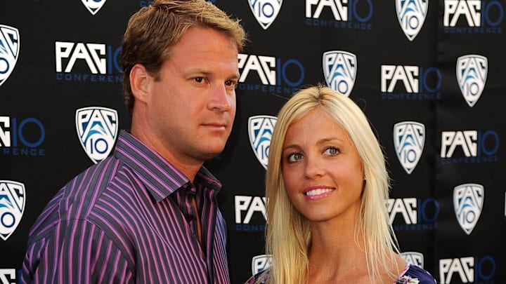Jul 29, 2010; Los Angeles, CA, USA; Then Southern California Trojans coach Lane Kiffin (left) and wife Layla Kiffin (right) at the Fox Sports-Pacific-10 Conference Hollywood Premiere Night at the 20th Century Fox studios.