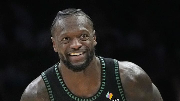 Jan 6, 2026; Minneapolis, Minnesota, USA; Minnesota Timberwolves forward Julius Randle (30) celebrates his three-point basket against the Miami Heat that beat the shot clock in the third quarter at Target Center. Mandatory Credit: Bruce Kluckhohn-Imagn Images