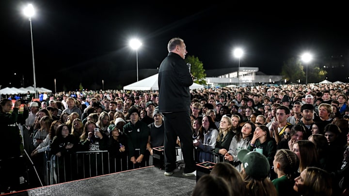 Tom Izzo speaks to the crowd during the Izzone campout on Friday, Oct. 4, 2024, at Munn Field in East Lansing.