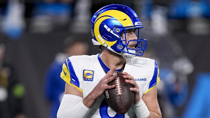 Jan 10, 2026; Charlotte, NC, USA; Los Angeles Rams quarterback Matthew Stafford (9) back to pass during the second half of the NFC Wild Card Round game between the Carolina Panthers and the Los Angeles Rams at Bank of America Stadium. Mandatory Credit: Jim Dedmon-Imagn Images