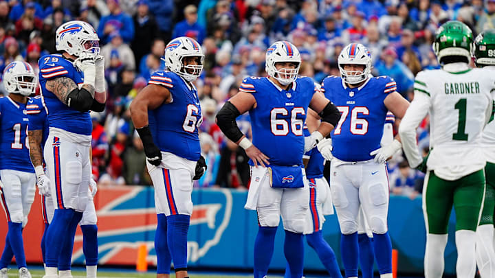 Buffalo Bills offensive tackle Spencer Brown (79), Buffalo Bills guard O'Cyrus Torrence (64), Buffalo Bills guard Connor McGovern (66) and Buffalo Bills guard David Edwards (76) get ready to line up during first half action at the Bills home game against the New York Jets at Highmark Stadium in Orchard Park on Dec. 29, 2024.