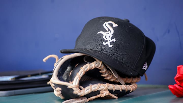 Jul 15, 2023; Atlanta, Georgia, USA; A detailed view of a Chicago White Sox hat and glove in the dugout against the Atlanta Braves in the first inning at Truist Park. Mandatory Credit: Brett Davis-Imagn Images Jul 15, 2023; Atlanta, Georgia, USA; A detailed view of a Chicago White Sox hat and glove in the dugout against the Atlanta Braves in the first inning at Truist Park. Mandatory Credit: Brett Davis-Imagn Images