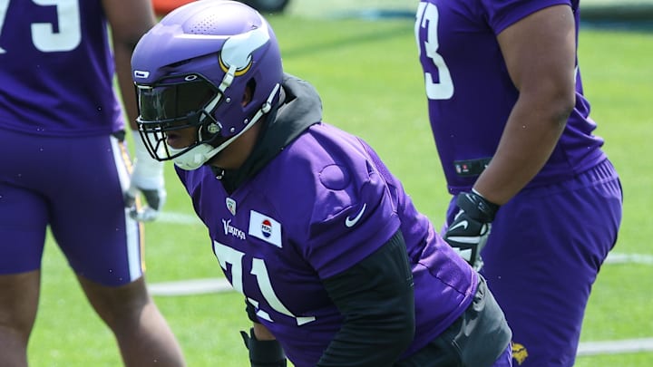 Jun 10, 2025; Minneapolis, MN, USA; Minnesota Vikings offensive tackle Christian Darrisaw (71) practices during minicamp at the Minnesota Vikings Training Facility. Mandatory Credit: Matt Krohn-Imagn Images