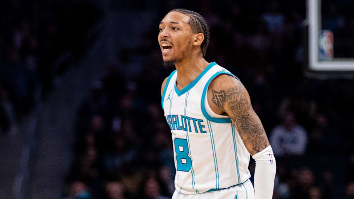 Mar 7, 2025; Charlotte, North Carolina, USA; Charlotte Hornets guard Nick Smith Jr. (8) celebrates against the Cleveland Cavaliers during the second quarter at Spectrum Center. Mandatory Credit: Scott Kinser-Imagn Images