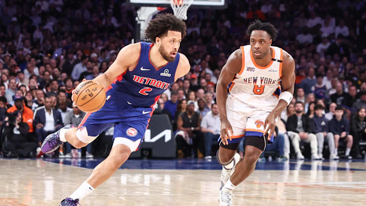 Apr 29, 2025; New York, New York, USA; Detroit Pistons guard Cade Cunningham (2) drives past New York Knicks forward OG Anunoby (8) in the second quarter during game five of first round for the 2025 NBA Playoffs at Madison Square Garden. Mandatory Credit: Wendell Cruz-Imagn Images