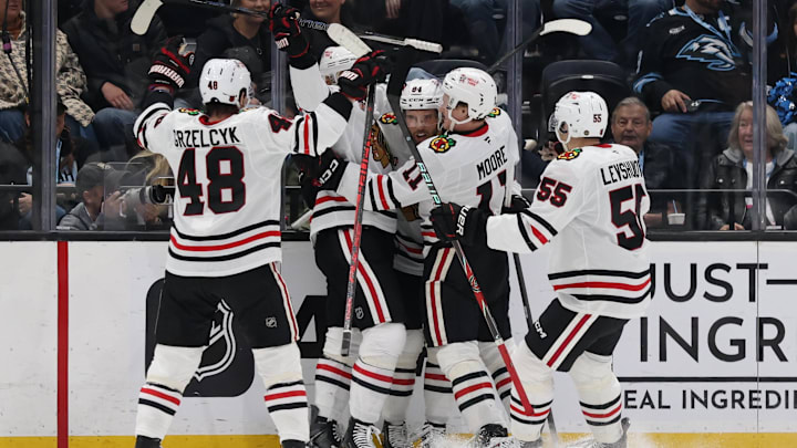 Mar 1, 2026; Salt Lake City, Utah, USA; The Chicago Blackhawks celebrate a goal by left wing Landon Slaggert (84) against the Utah Mammoth during the second period at Delta Center. Mandatory Credit: Rob Gray-Imagn Images
