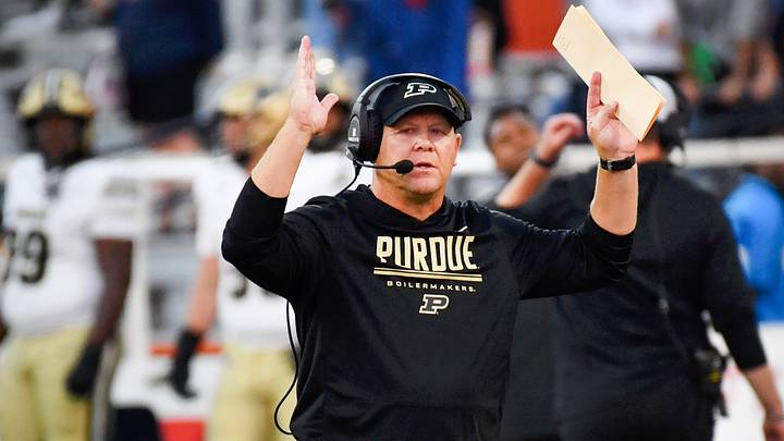 Oct 3, 2026; Champaign, Illinois, USA;  Purdue Boilermakers head coach Barry Odom signals a touchdown on the sidelines during the second half against the Illinois Fighting Illini at Gies Memorial Stadium.  Mandatory Credit: Ron Johnson-Imagn Images