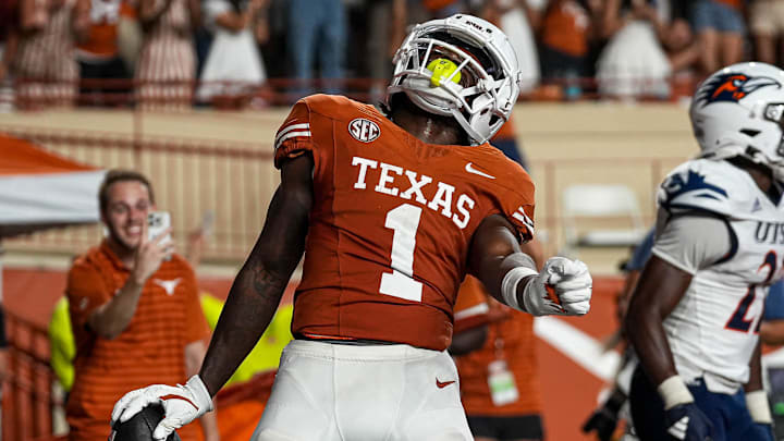 Sep 14, 2024; Austin, Texas, USA; Texas Longhorns receiver Johntay Cook II (1) celebrates a touchdown catch during the game against UTSA at Darrell K Royal–Texas Memorial Stadium. Mandatory Credit: Aaron E. Martinez/USA TODAY Network via Imagn Images