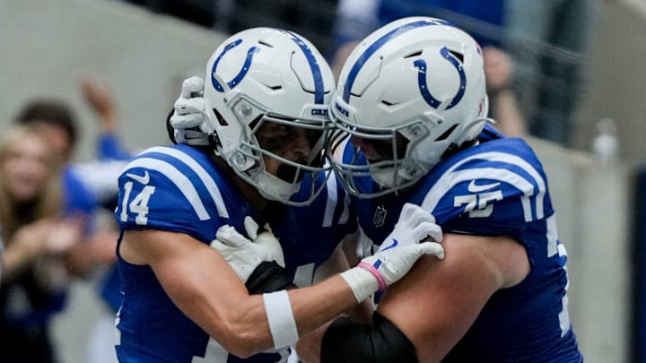Indianapolis Colts wide receiver Alec Pierce (14) celebrates with Indianapolis Colts guard Will Fries (75) after scoring a touchdown Sunday, Sept. 8, 2024, during a game against the Houston Texans at Lucas Oil Stadium in Indianapolis.