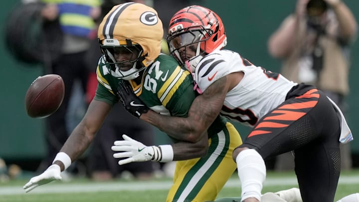Cincinnati Bengals cornerback DJ Turner II (20) forces an incomplete pass intended for Green Bay Packers wide receiver Romeo Doubs (87) during the first quarter of their game Sunday, October 12, 2025, at Lambeau Field in Green Bay, Wisconsin.