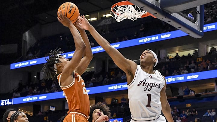 Mar 13, 2025; Nashville, TN, USA; Texas Longhorns guard Tre Johnson (20) shoots over Texas A&M Aggies guard Zhuric Phelps (1) during the second half at Bridgestone Arena. Mandatory Credit: Steve Roberts-Imagn Images Mar 13, 2025; Nashville, TN, USA; Texas Longhorns guard Tre Johnson (20) shoots over Texas A&M Aggies guard Zhuric Phelps (1) during the second half at Bridgestone Arena. Mandatory Credit: Steve Roberts-Imagn Images