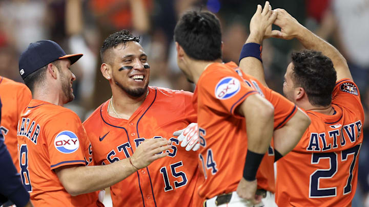 May 13, 2025; Houston, Texas, USA; Houston Astros third baseman Isaac Paredes (15) celebrates his walk off home run with teammates against the Kansas City Royals in the ninth inning at Daikin Park.