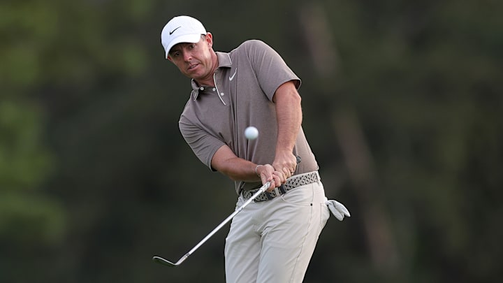 Rory McIlroy hits a chip shot during the first round of the 2025 Masters at Augusta National