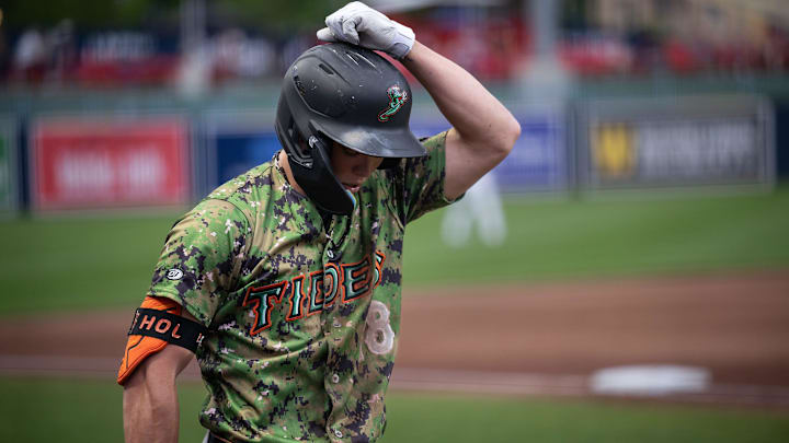 Norfolk's Jackson Holliday, the No. 1 overall draft pick in 2022 and top prospect in baseball in most ranking systems, walks to the batter's box during Tuesday's game at Polar Park.