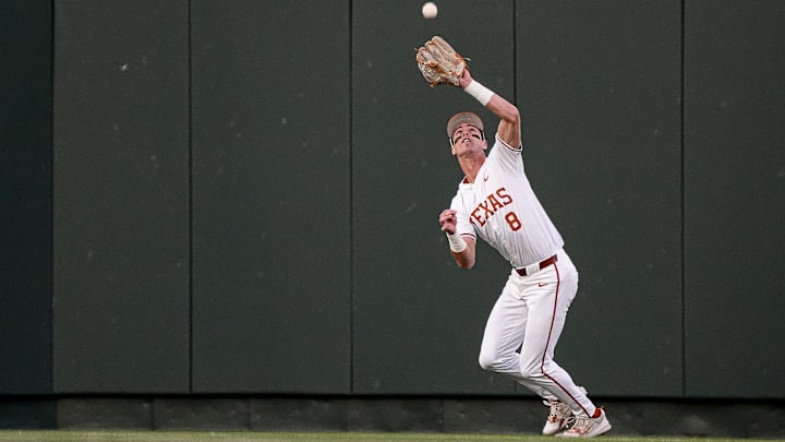 Texas Longhorns outfielder Will Gasparino (8) catches a fly ball during the game against LSU at UFCU Disch-Falk Field on Friday, March. 21, 2025.