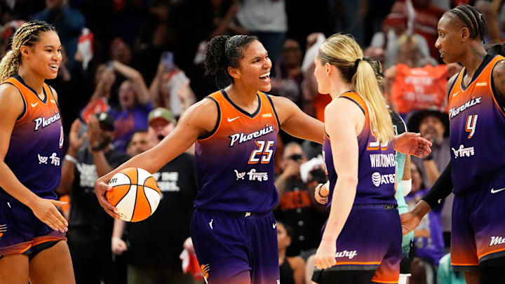 Phoenix Mercury forward Alyssa Thomas (25) celebrates with her teammates as they defeat the New York Liberty 79-73 to win the series during Game Three of the 2025 WNBA Playoffs first round at PHX Arena on Sept. 19, 2025, in Phoenix.