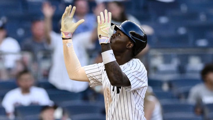 New York Yankees third baseman Jazz Chisholm Jr. (13) reacts after hitting a solo home run against the Texas Rangers during the eighth inning at Yankee Stadium.