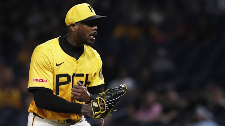 Aug 23, 2024; Pittsburgh, Pennsylvania, USA;  Pittsburgh Pirates relief pitcher Aroldis Chapman (45) reacts after striking out Cincinnati Reds center fielder Stuart Fairchild (not pictured) to end the eighth inning at PNC Park. Pittsburgh won 6-5.