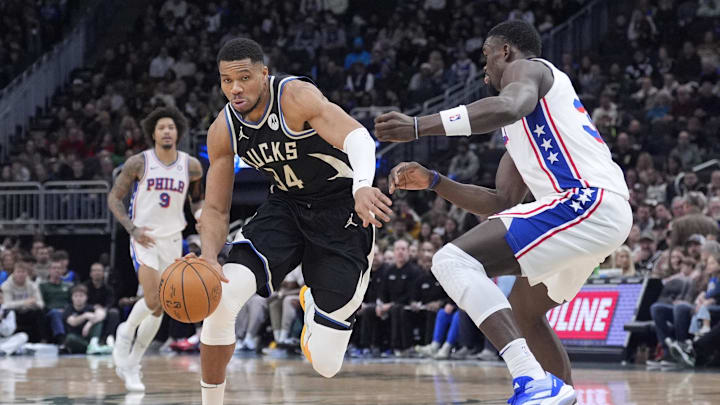 Jan 19, 2025; Milwaukee, Wisconsin, USA; Milwaukee Bucks forward Giannis Antetokounmpo (34) drives to the basket against Philadelphia 76ers center Adem Bona (30) in the first half at Fiserv Forum. Mandatory Credit: Michael McLoone-Imagn Images Jan 19, 2025; Milwaukee, Wisconsin, USA; Milwaukee Bucks forward Giannis Antetokounmpo (34) drives to the basket against Philadelphia 76ers center Adem Bona (30) in the first half at Fiserv Forum. Mandatory Credit: Michael McLoone-Imagn Images