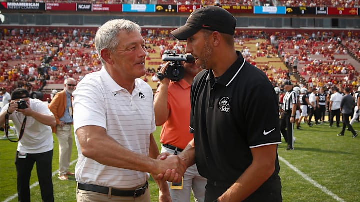 Iowa State head football coach Matt Campbell, right, shakes hands with Iowa head football coach Kirk Ferentz prior to kickoff at Jack Trice Stadium in Ames on Saturday, Sept. 11, 2021.

20210911 Cyhawk