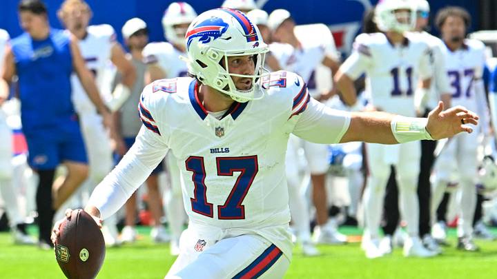 Buffalo Bills quarterback Josh Allen moves out of the pocket against the Carolina Panthers at the New Highmark Stadium.
