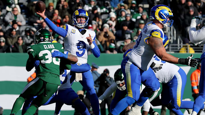 Dec 22, 2024; East Rutherford, New Jersey, USA; Los Angeles Rams quarterback Matthew Stafford (9) throws a pass against the New York Jets during the second quarter at MetLife Stadium. Mandatory Credit: Brad Penner-Imagn Images
