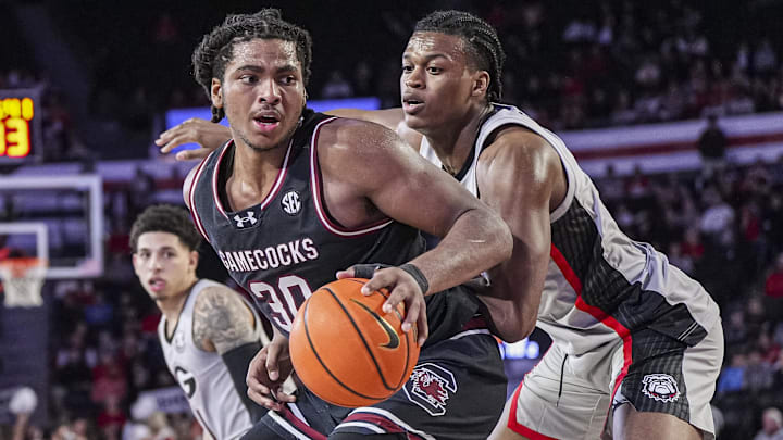 Jan 28, 2025; Athens, Georgia, USA; South Carolina Gamecocks forward Collin Murray-Boyles (30) dribbles against Georgia Bulldogs forward RJ Godfrey (10) at Stegeman Coliseum. Mandatory Credit: Dale Zanine-Imagn Images Jan 28, 2025; Athens, Georgia, USA; South Carolina Gamecocks forward Collin Murray-Boyles (30) dribbles against Georgia Bulldogs forward RJ Godfrey (10) at Stegeman Coliseum. Mandatory Credit: Dale Zanine-Imagn Images