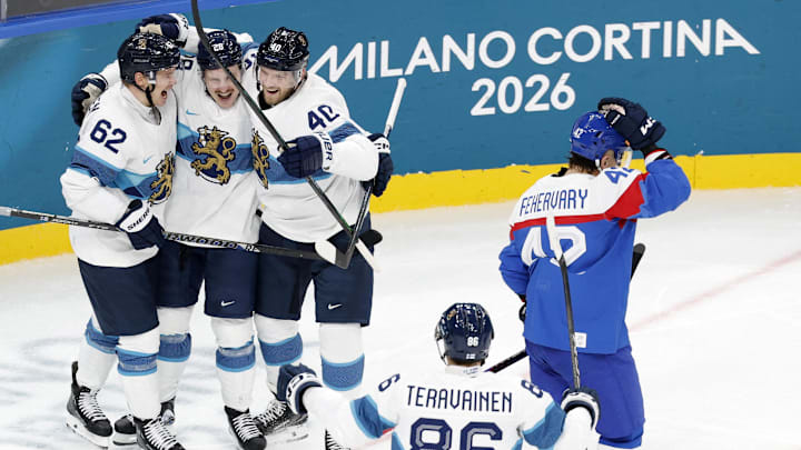 [US, Mexico & Canada customers only] Feb 11, 2026; Milan, Italy;  Eeli Tolvanen of Finland celebrates scoring their first goal with Artturi Lehkonen, Joel Armia and Teuvo Teravainen against Slovakia in men's ice hockey group B play during the Milano Cortina 2026 Olympic Winter Games at Milano Santagiulia Ice Hockey Arena. Mandatory Credit: David W Cerny/Reuters via Imagn Images
