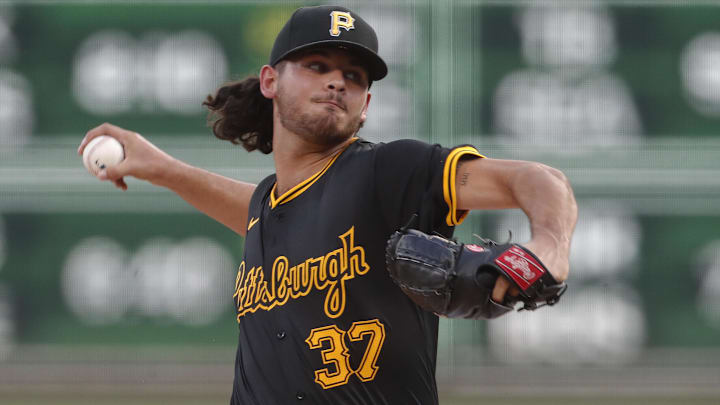 Aug 27, 2024; Pittsburgh, Pennsylvania, USA;  Pittsburgh Pirates starting pitcher Jared Jones (37) delivers a pitch against the Chicago Cubs during the first inning at PNC Park. Mandatory Credit: Charles LeClaire-Imagn Images