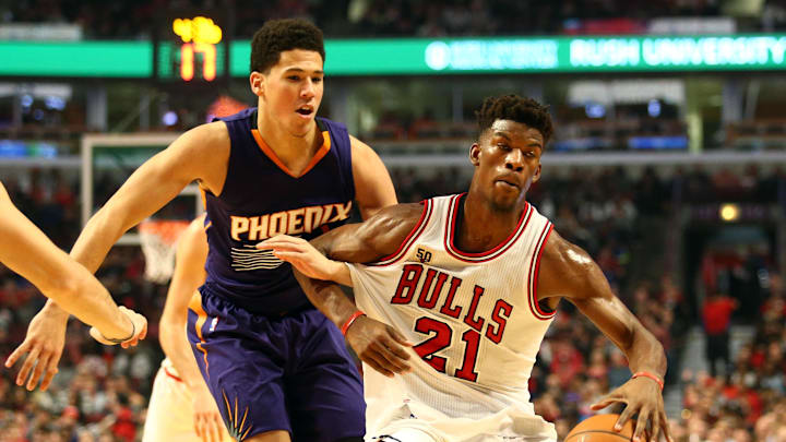 Dec 7, 2015; Chicago, IL, USA; Chicago Bulls guard Jimmy Butler (21) and Phoenix Suns guard Devin Booker (1) get caught up during the second half at United Center. Mandatory Credit: Caylor Arnold-Imagn Images Dec 7, 2015; Chicago, IL, USA; Chicago Bulls guard Jimmy Butler (21) and Phoenix Suns guard Devin Booker (1) get caught up during the second half at United Center. Mandatory Credit: Caylor Arnold-Imagn Images