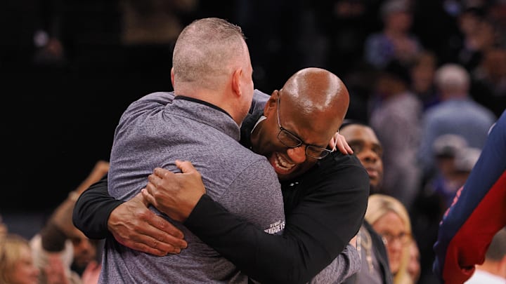 Feb 9, 2024; Sacramento, California, USA; Denver Nuggets head coach Michael Malone hugs Sacramento Kings head coach Mike Brown after the game at Golden 1 Center. Mandatory Credit: Kelley L Cox-Imagn Images