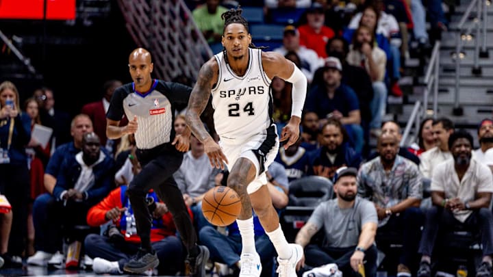 Oct 24, 2025; New Orleans, Louisiana, USA;  San Antonio Spurs guard/forward Devin Vassell (24) brings the ball up court against the New Orleans Pelicans during the first half at Smoothie King Center. Mandatory Credit: Stephen Lew-Imagn Images Oct 24, 2025; New Orleans, Louisiana, USA;  San Antonio Spurs guard/forward Devin Vassell (24) brings the ball up court against the New Orleans Pelicans during the first half at Smoothie King Center. Mandatory Credit: Stephen Lew-Imagn Images