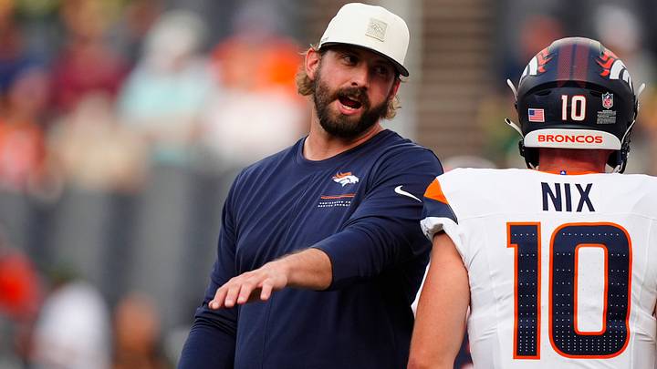 Denver Broncos offensive coordinator Davis Webb before the preseason game against the Green Bay Packers at Empower Field at Mile High. Denver Broncos offensive coordinator Davis Webb before the preseason game against the Green Bay Packers at Empower Field at Mile High.